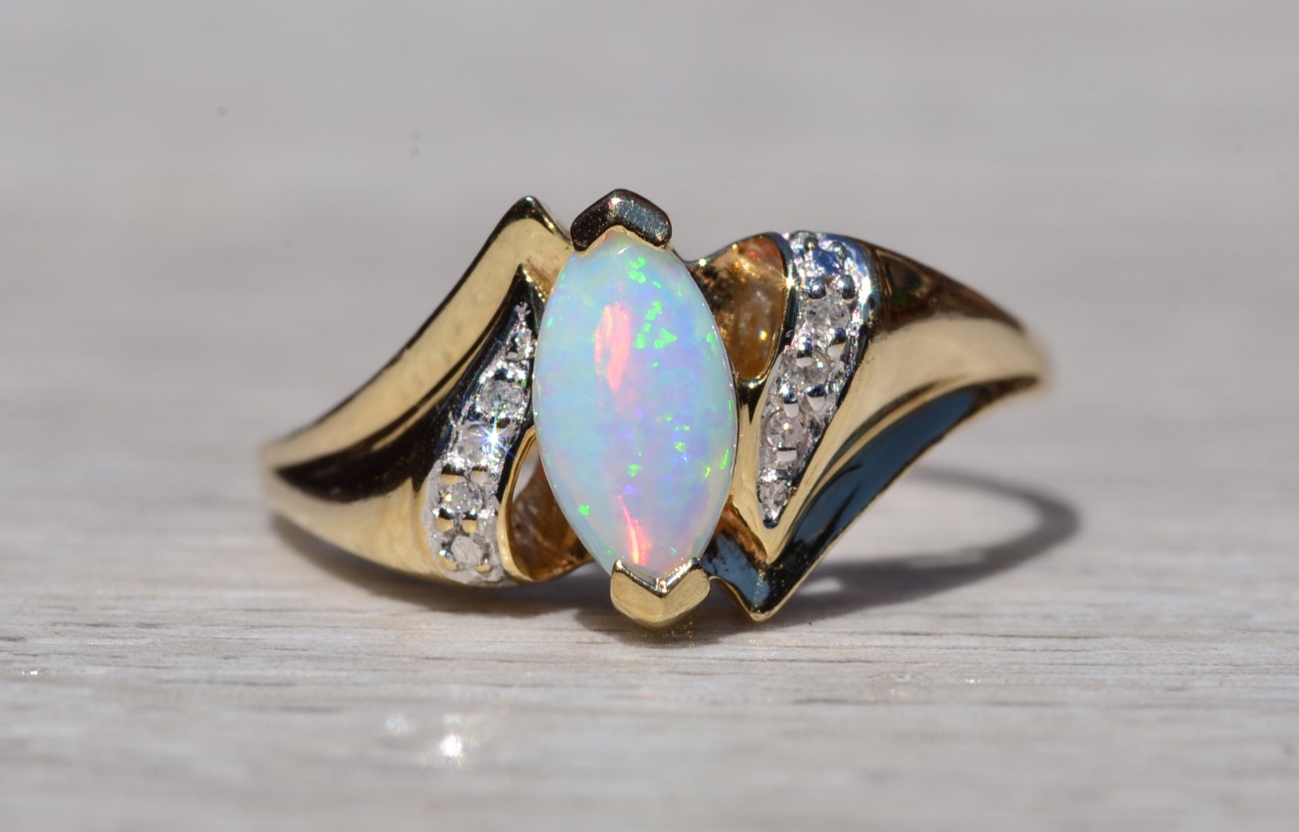 The Cortez: Navette Opal and Diamond Ring in Yellow Gold - Image 2