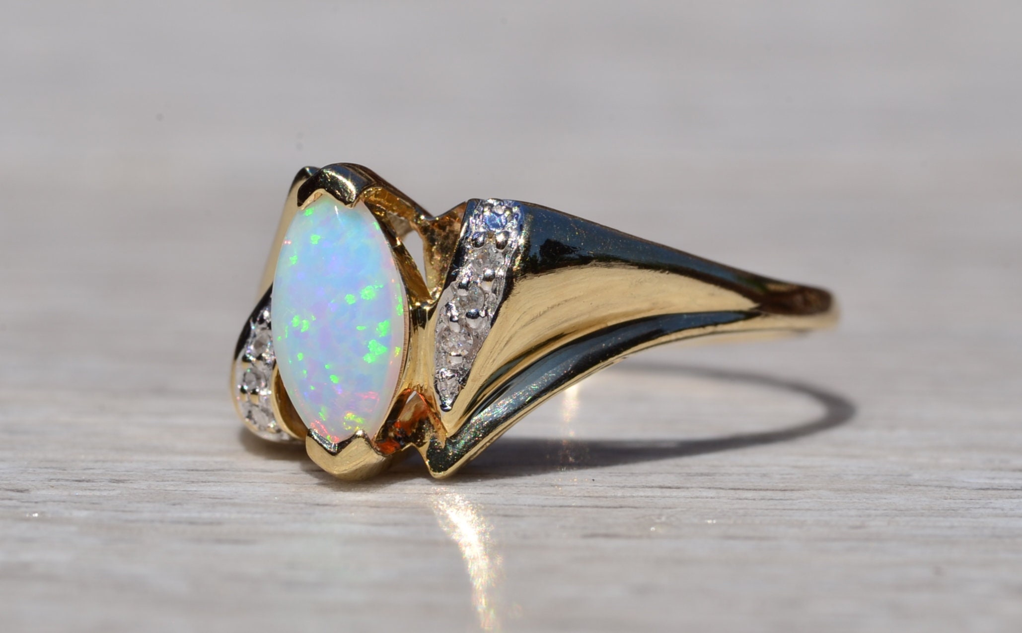 The Cortez: Navette Opal and Diamond Ring in Yellow Gold - Image 3