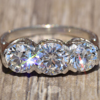 SOLD - The Daffodil:  Antique Platinum Edwardian Three Stone Engagement Ring