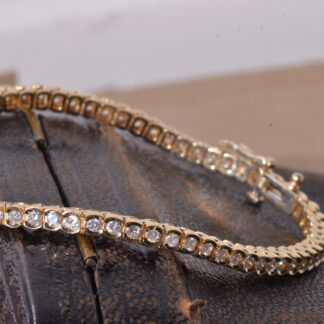 SOLD - The Deporte:  14 Karat Yellow Gold Half Bezel Set Diamond Tennis Bracelet