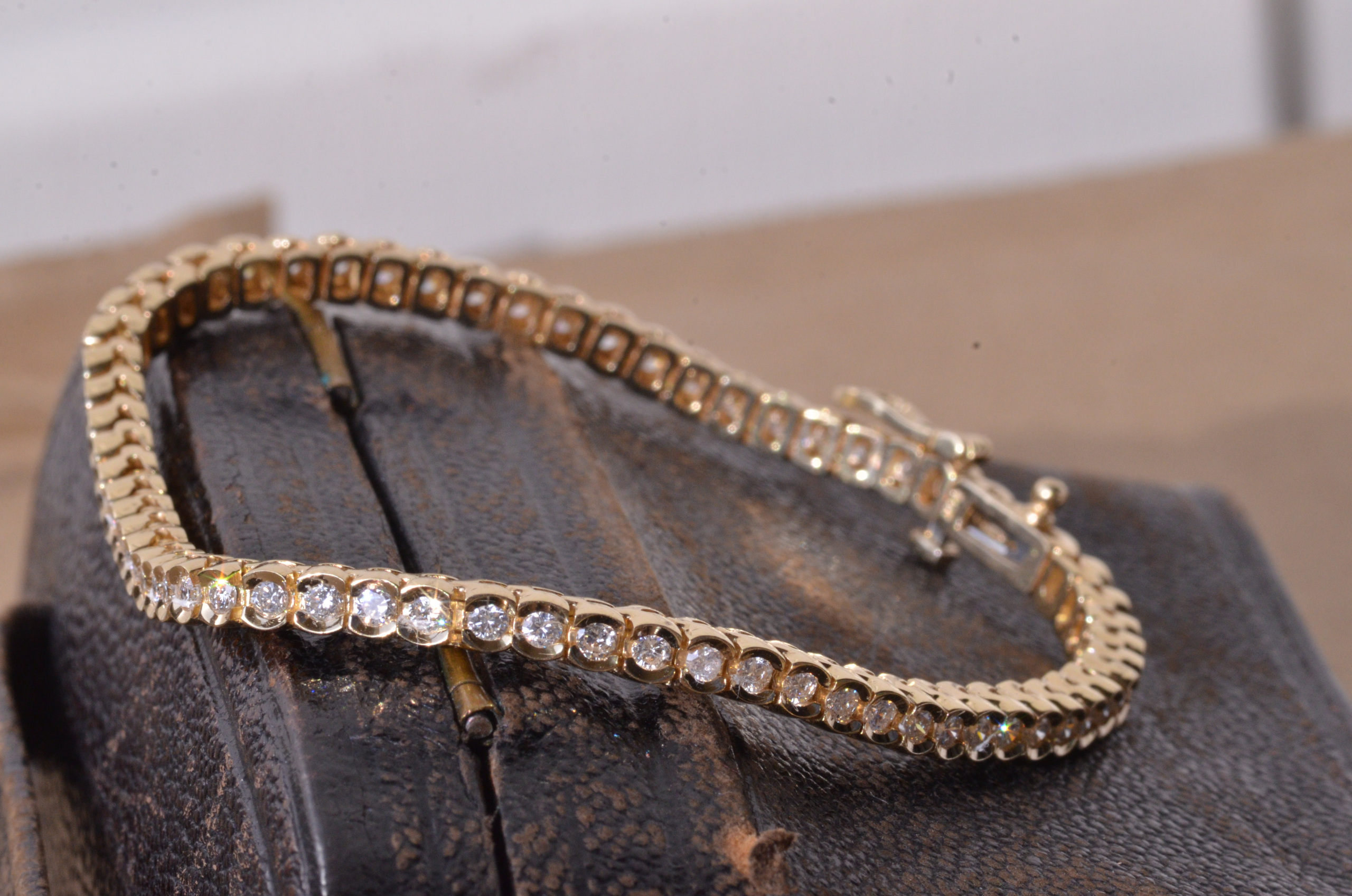 SOLD - The Deporte: 14 Karat Yellow Gold Half Bezel Set Diamond Tennis Bracelet