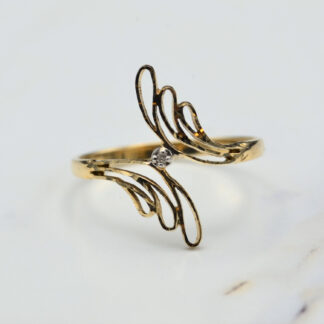 SOLD - The Butano:  Contemporary Diamond Cut Bypass Ring set with Diamond in Yellow Gold