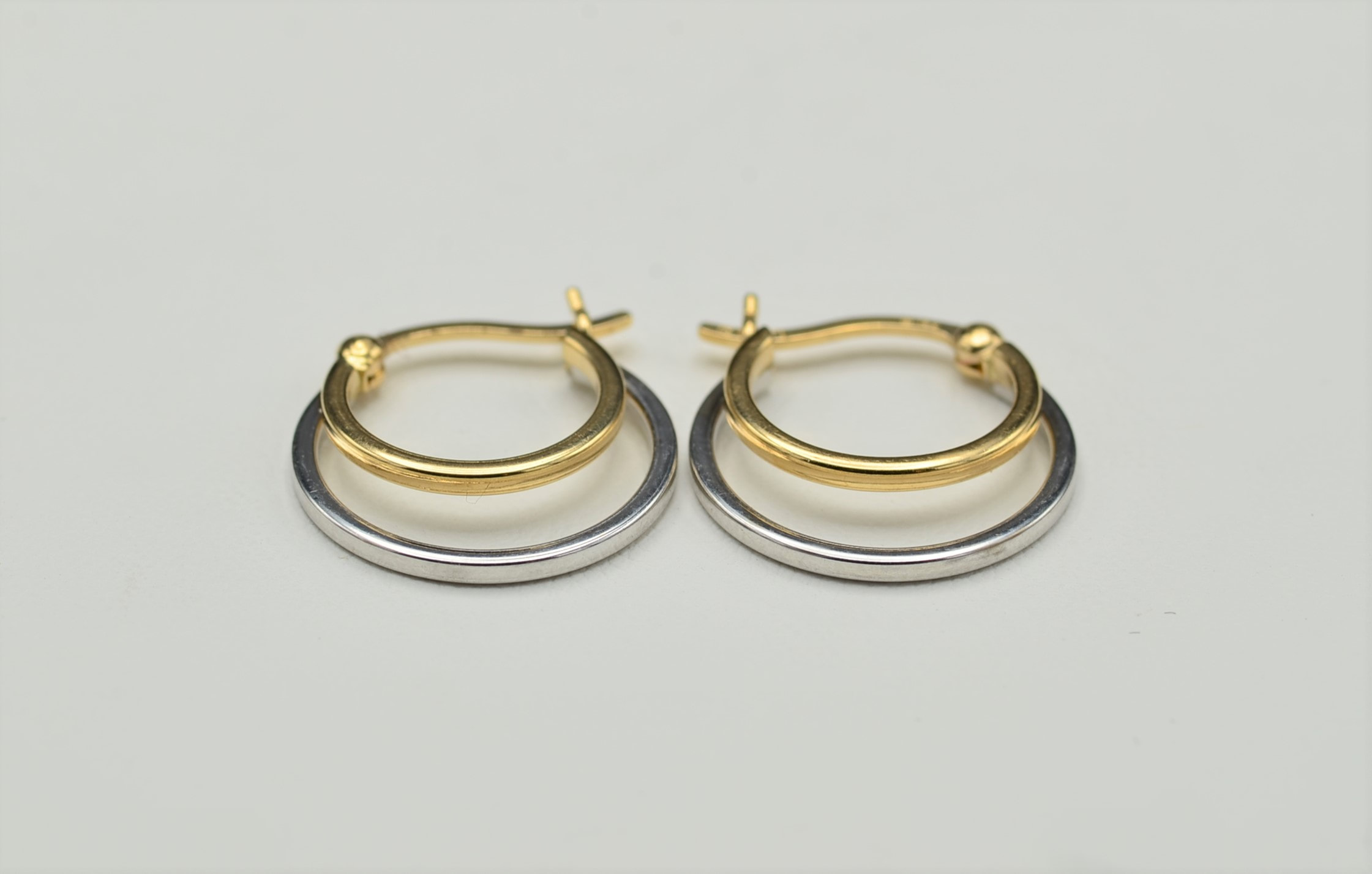 SOLD - The Rasalas: 14K Two Tone Gold Double Hoop Earrings