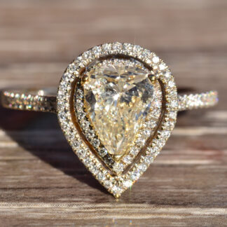 The Arcadia:  Pear Shaped Double Halo Engagement Ring