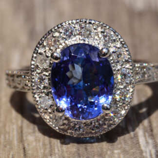 SOLD - The Rochester:  Oval Tanzanite and Diamond Halo Ring