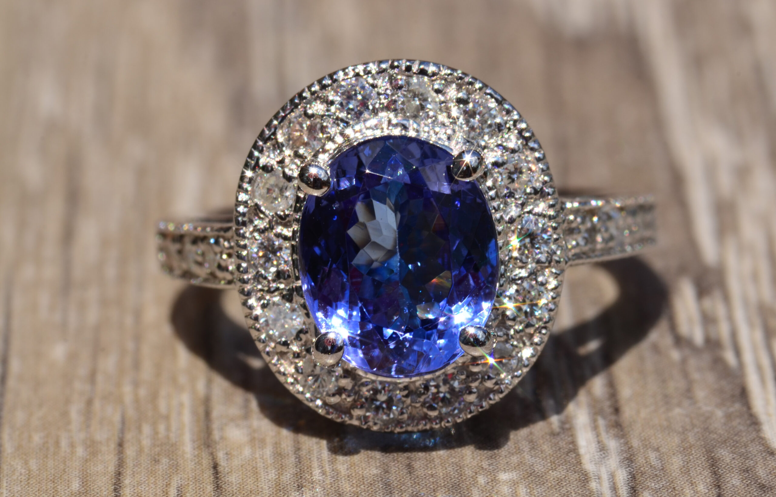 SOLD - The Rochester: Oval Tanzanite and Diamond Halo Ring
